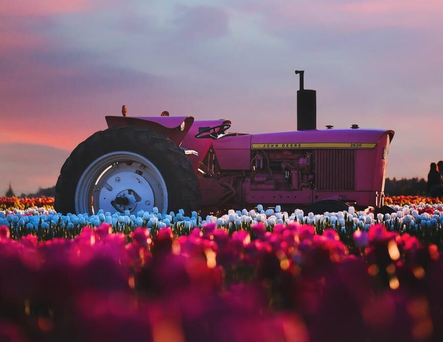photo of ride on tractor during sunset